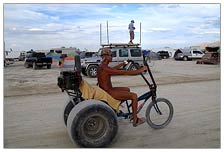 I arrived at night and set camp in quiet spot, but woke up the next morning to find people all around me, busy setting up camp. It was pretty quiet, and I picked a sweet spot. As I was having coffee, a naked triker dude pedaled by.
