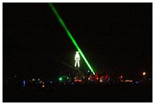 These lasers were deceptive, seeming to be shining from one end of the playa to the other, several miles, and doesn't seem so in the picture, when seeing the whole length of it, almost even seeming to bending in a curve. WTF, seriously trippy